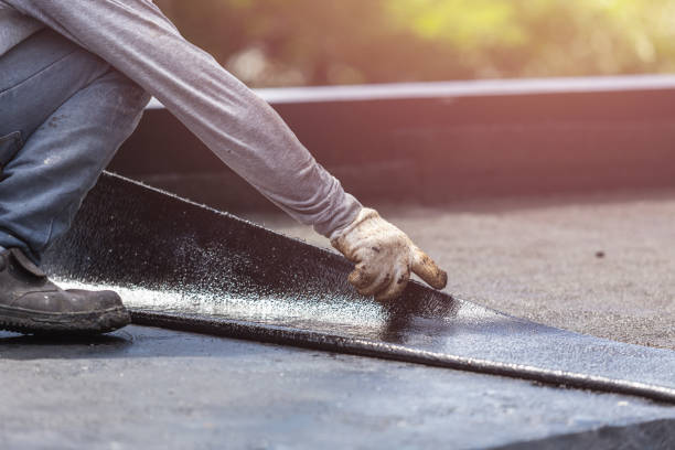 Professional Basement Waterproofing technician working in Hanna, IN